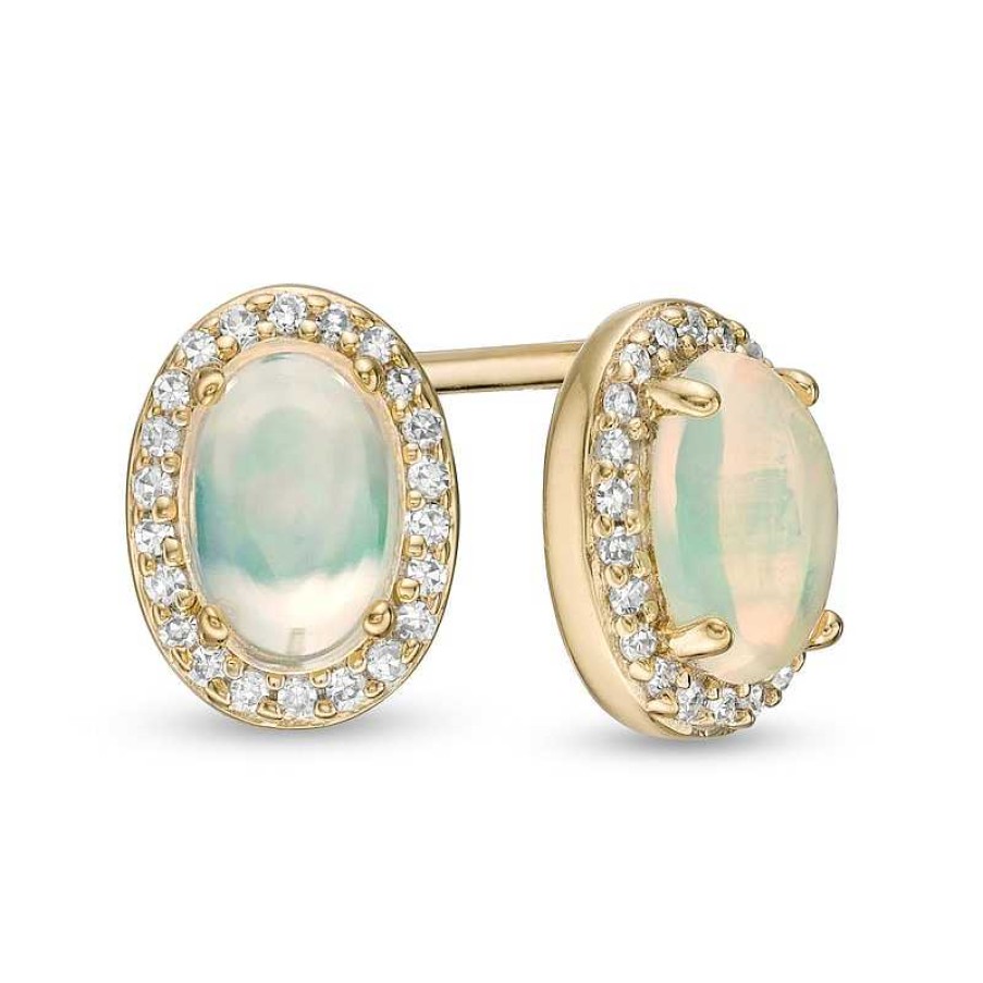 Earrings Zales | Oval Opal And 1/10 Ct. T.W. Diamond Frame Stud Earrings In 10K Gold