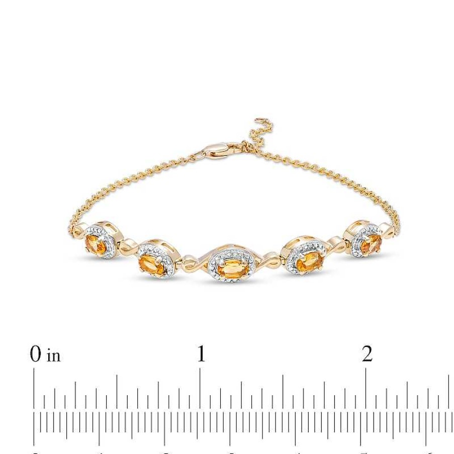 Bracelets Zales | Oval Citrine And Diamond Accent Twist Five Stone Bracelet In 10K Gold – 8.0"