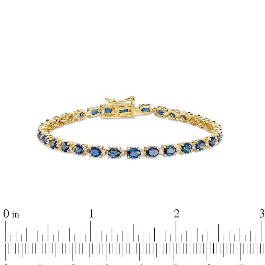 Bracelets Zales | Oval Blue Sapphire And 1/6 Ct. T.W. Diamond Alternating Line Bracelet In 10K Gold