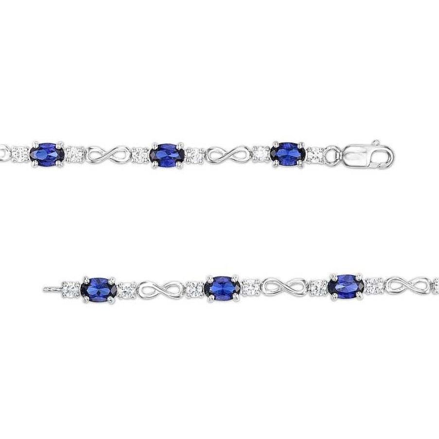 Bracelets Zales | Oval Blue And White Lab-Created Sapphire Alternating Infinity Line Bracelet In Sterling Silver - 7.25"