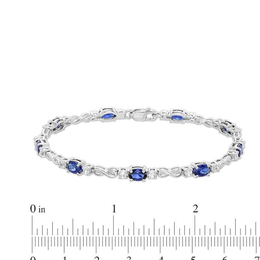 Bracelets Zales | Oval Blue And White Lab-Created Sapphire Alternating Infinity Line Bracelet In Sterling Silver - 7.25"