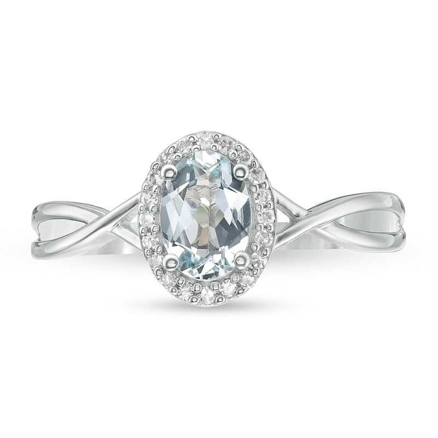 Rings Zales | Oval Aquamarine And 1/15 Ct. T.W. Diamond Frame Twist Shank Ring In 10K White Gold