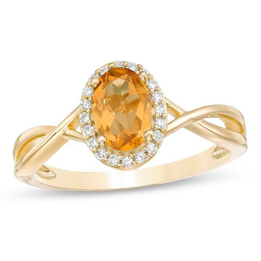 Rings Zales | Oval Citrine And 1/15 Ct. T.W. Diamond Frame Twist Shank Ring In 10K Gold