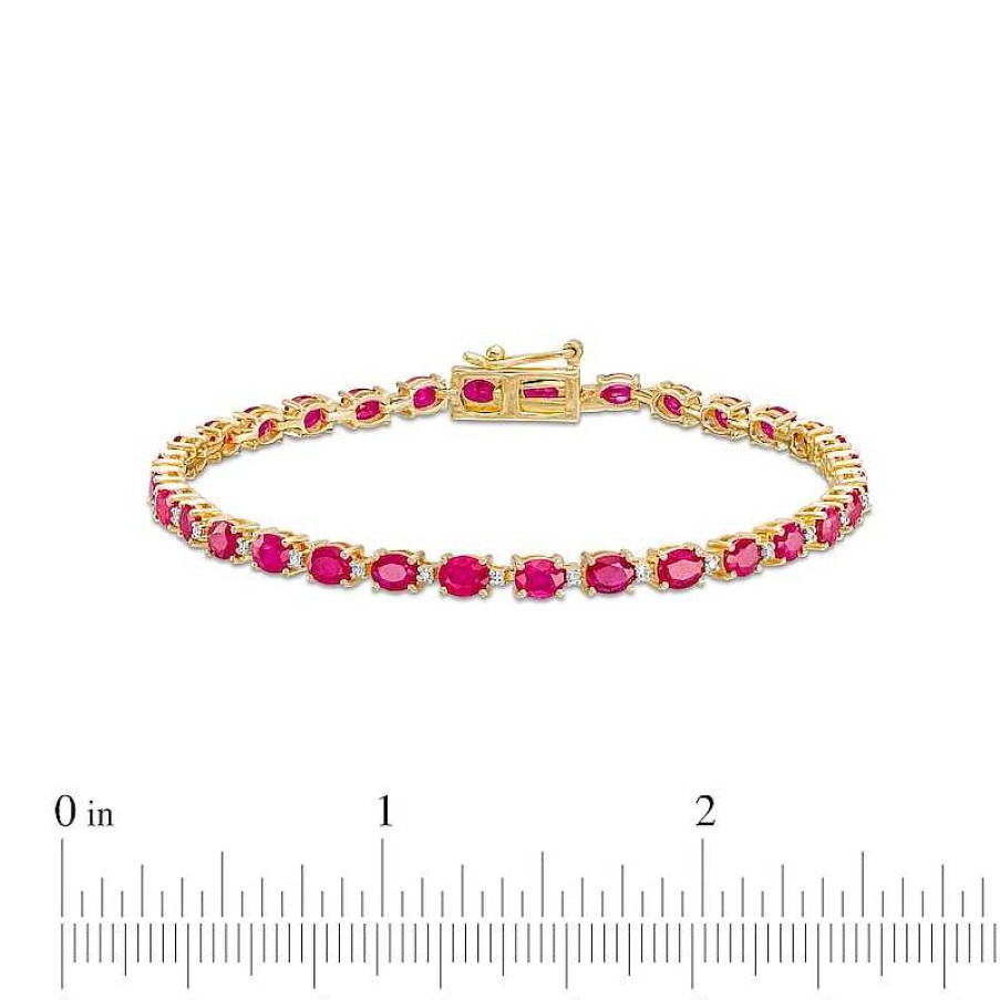 Bracelets Zales | Oval Ruby And 1/6 Ct. T.W. Diamond Alternating Line Bracelet In 10K Gold