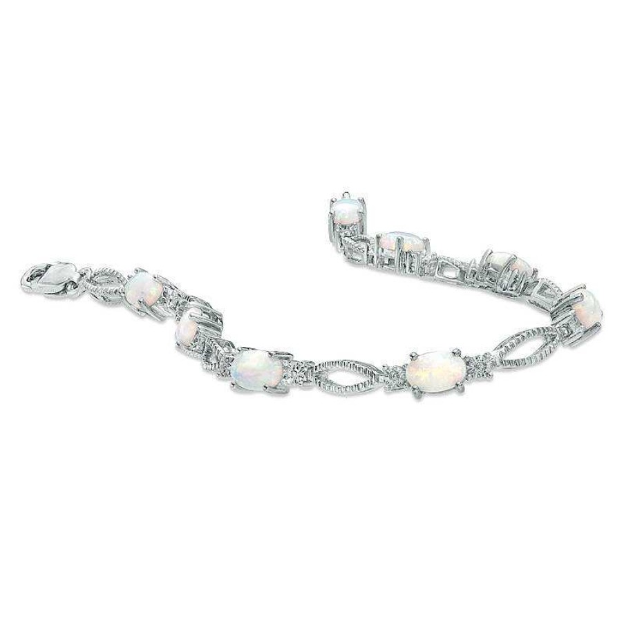 Bracelets Zales | Oval Lab-Created Opal And Diamond Accent Bracelet In Sterling Silver - 7.25"