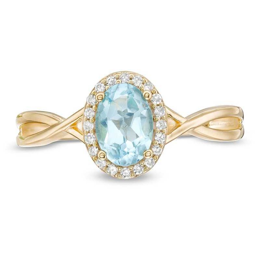 Rings Zales | Oval Swiss Blue Topaz And 1/15 Ct. T.W. Diamond Frame Twist Shank Ring In 10K Gold