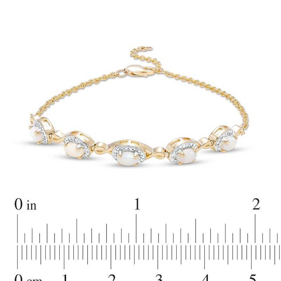 Bracelets Zales | Oval Opal And Diamond Accent Twist Five Stone Bracelet In 10K Gold – 8.0"