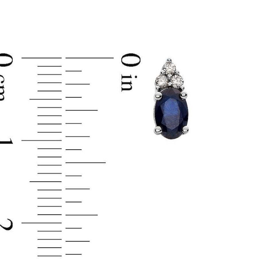 Earrings Zales | Oval Blue Sapphire And 1/10 Ct. T.W. Diamond Stud Earrings In 10K White Gold