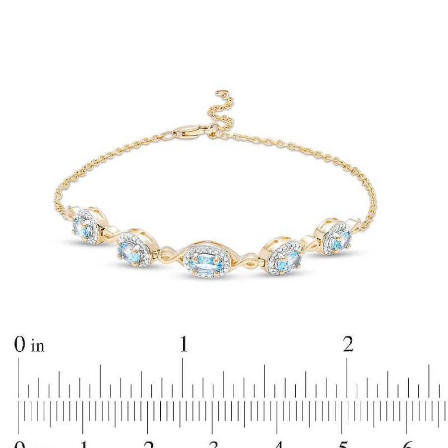 Bracelets Zales | Oval Swiss Blue Topaz And Diamond Accent Twist Five Stone Bracelet In 10K Gold – 8.0"