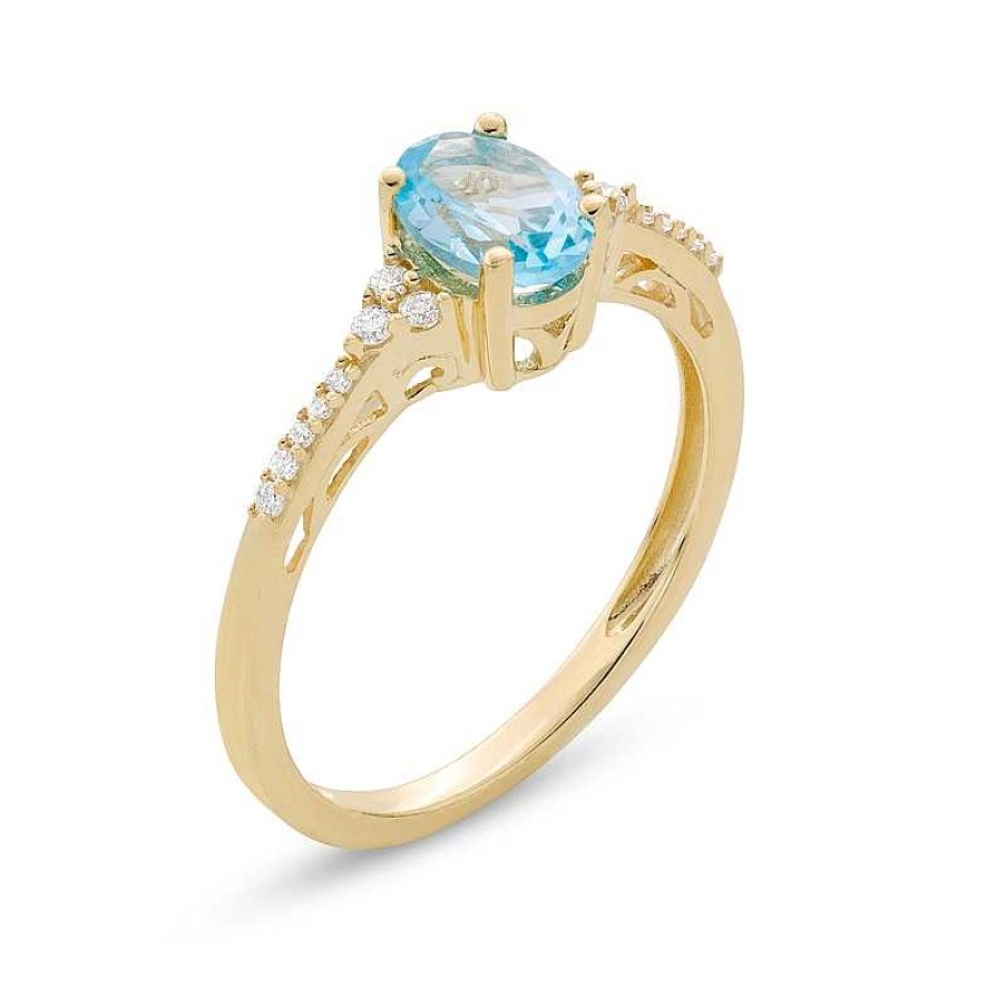 Rings Zales | Oval Swiss Blue Topaz And 1/10 Ct. T.W. Diamond Ring In 10K Gold