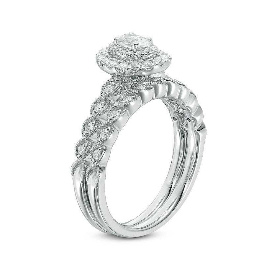 Rings Zales | 3/4 Ct. T.W. Oval Diamond Double Frame Twist Vintage-Style Bridal Set In 14K White Gold