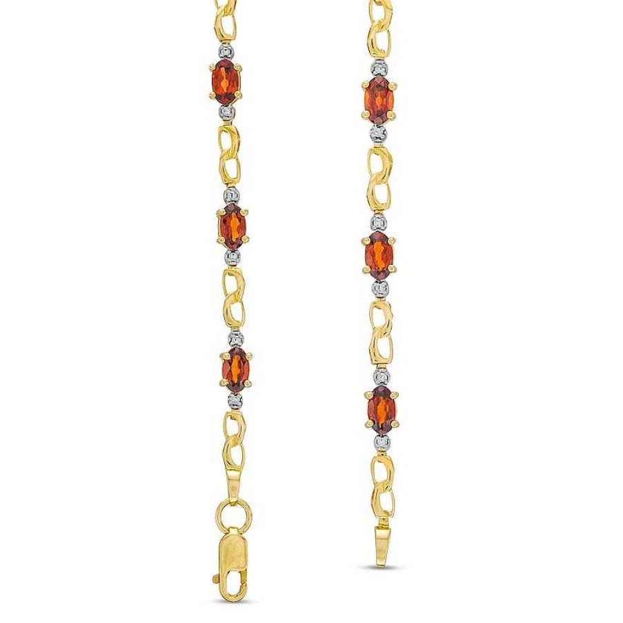 Bracelets Zales | Oval Lab-Created Ruby, Diamond Accent And Rice Bead Alternating Bracelet In 10K Gold - 7.25"