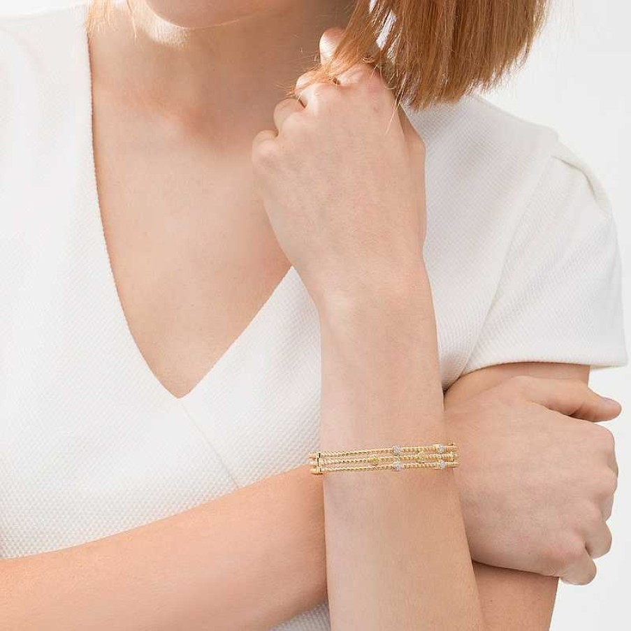 Bracelets Zales | 1/5 Ct. T.W. Enhanced Yellow And White Diamond Station Triple Row Rope Bangle In Sterling Silver With 14K Gold Plate