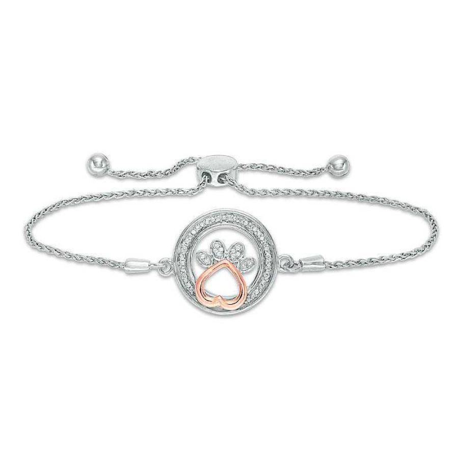 Bracelets Zales | 1/15 Ct. T.W. Diamond Open Circle With Paw Print Bolo Bracelet In Sterling Silver And 10K Rose Gold (1 Line) - 9.5"