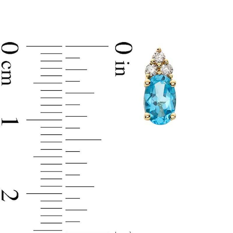 Earrings Zales | Oval Swiss Blue Topaz And 1/10 Ct. T.W. Diamond Stud Earrings In 10K Gold