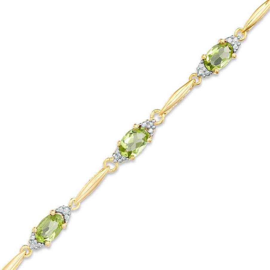 Bracelets Zales | Oval Peridot And Diamond Accent Bracelet In Sterling Silver And 10K Gold Plate - 7.25"