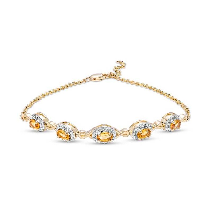 Bracelets Zales | Oval Citrine And Diamond Accent Twist Five Stone Bracelet In 10K Gold – 8.0"