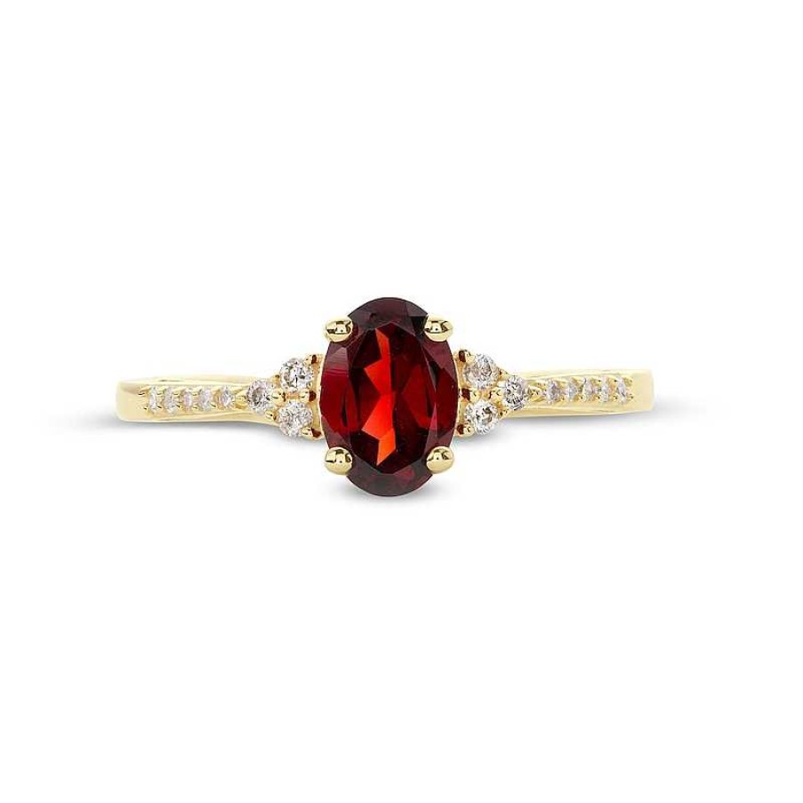 Rings Zales | Oval Garnet And 1/10 Ct. T.W. Diamond Ring In 10K Gold