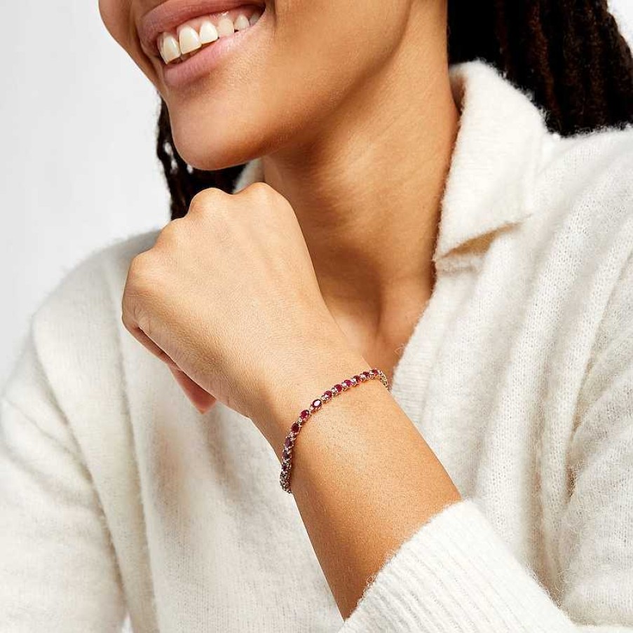 Bracelets Zales | Oval Ruby And 1/6 Ct. T.W. Diamond Alternating Line Bracelet In 10K Gold