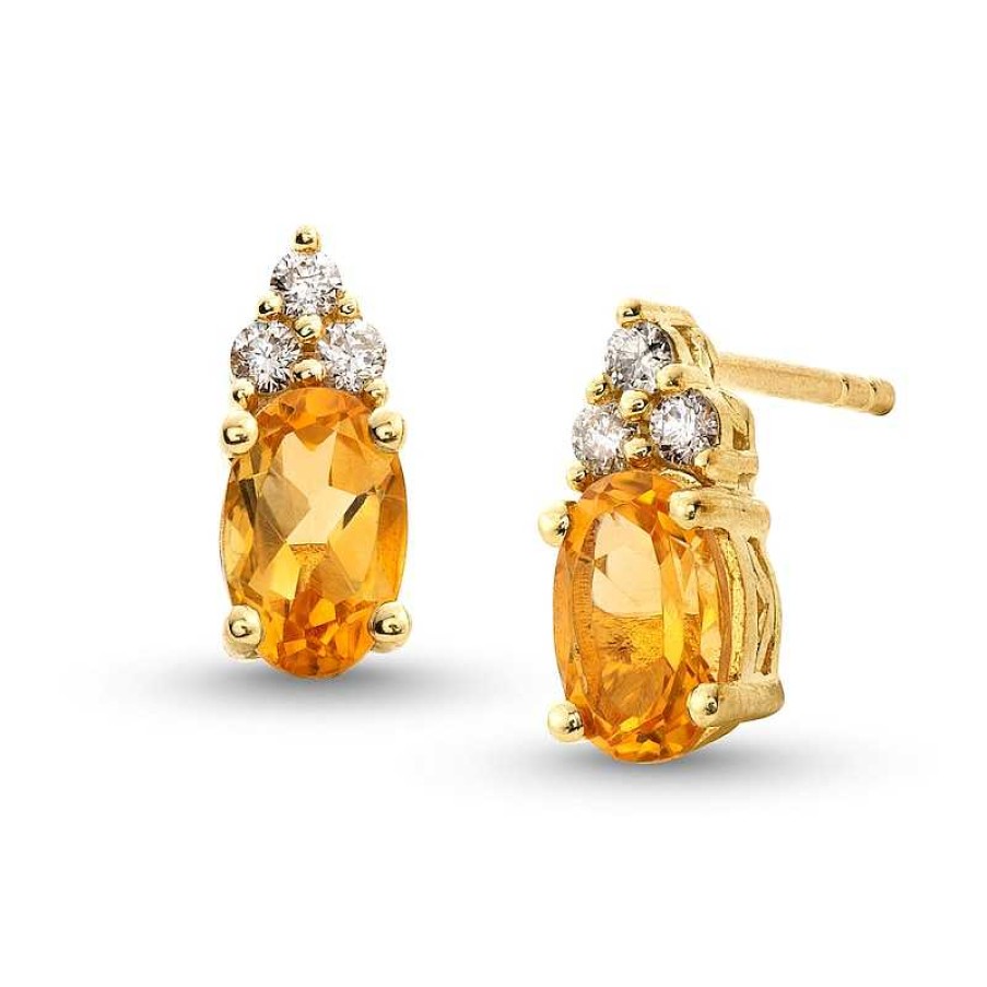 Earrings Zales | Oval Citrine And 1/10 Ct. T.W. Diamond Stud Earrings In 10K Gold