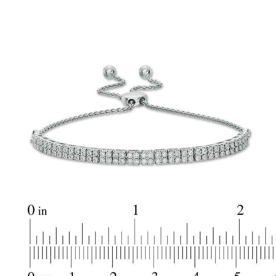 Bracelets Zales | Previously Owned - 1/3 Ct. T.W. Diamond Double Row Bolo Bracelet In 10K White Gold - 10"