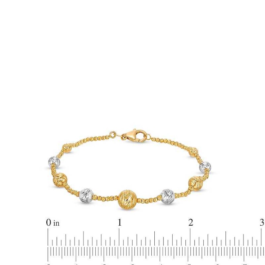 Bracelets Zales | Oro Diamante™ Graduating Hollow Brilliance Bead Bracelet In 14K Two-Tone Gold - 7.5"