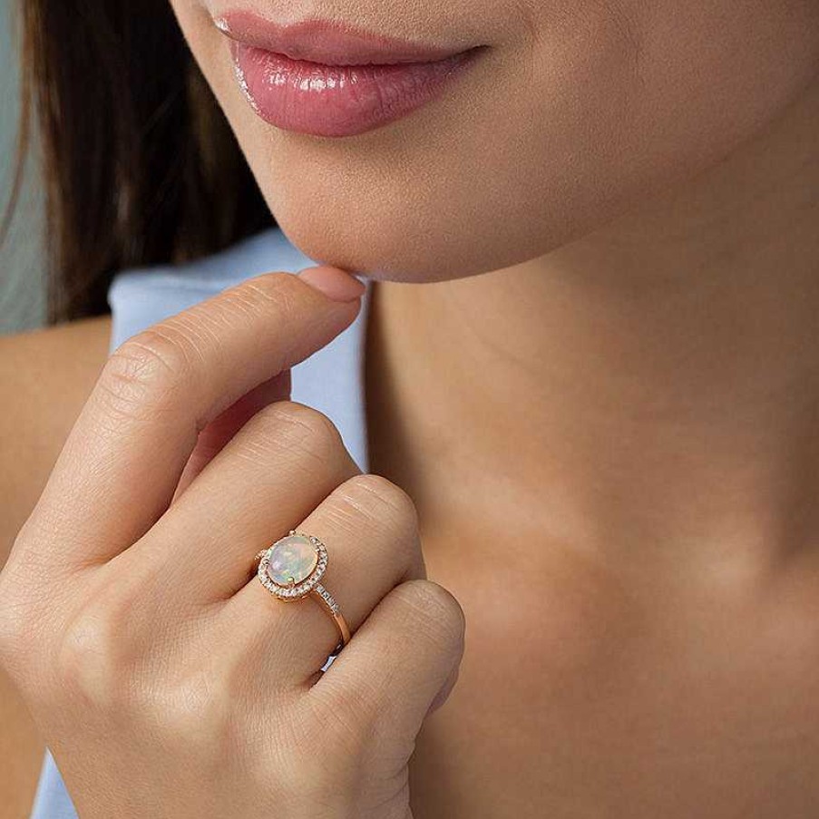 Rings Zales | Oval Opal And 1/6 Ct. T.W. Diamond Frame Ring In 14K Rose Gold